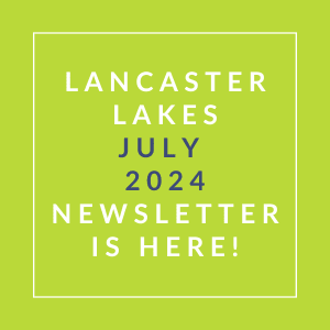 a yellow background with the words lancaster lakes july 2024 newsletter is here