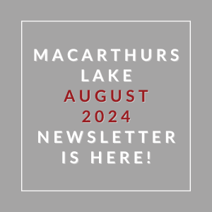 a sign that says macarthur lake august 23 newspaper is here