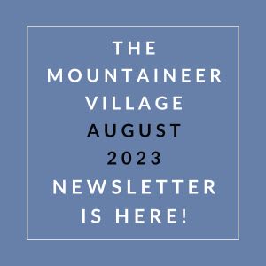 a sign that says the mountain village august 23 newspaper is here