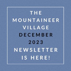 the mountain village december 2013 newsletter is here white font on a blue background