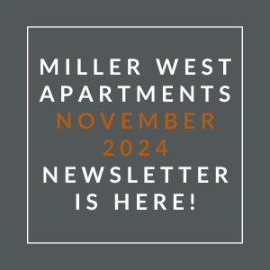 a white and orange box with the words apartments november 2024