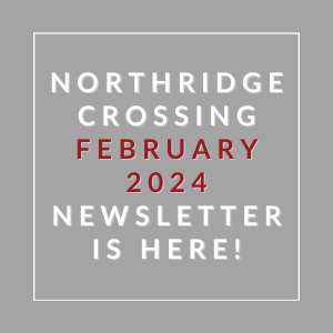 a gray background with white and red text and the words northern crossing january 2022