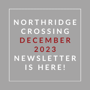 a gray background with white and red text and the words northern crossing december 2022