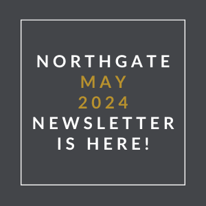 a white and yellow box with the words northeastern may 2022 newsletter is here