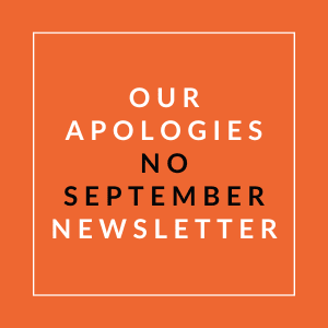A sign that says "Our Apologies No September Newsletter".