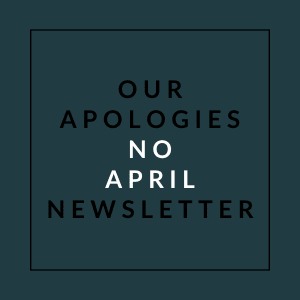 A poster with the text "Our Apologies No April Newsletter" written on it.