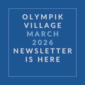 A blue square with white text announcing the Olympik Village March 2026 newsletter.