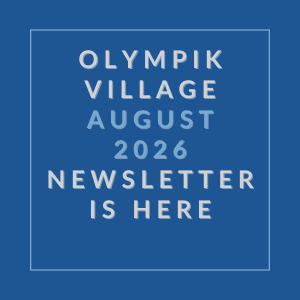 A blue square with white text announcing the Olympik Village August 2026 newsletter.