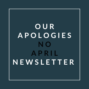 A poster with the text "Our Apologies No April Newsletter" written on it.