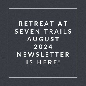a black and white photo of a sign that says retreat at seven trails august