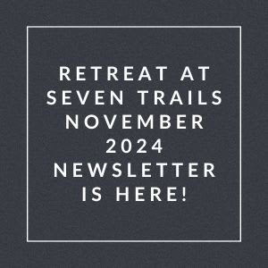 a black and white photo of a sign that says retreat at seven trails nove