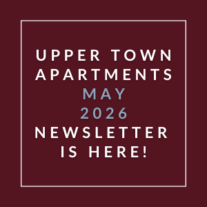 a blue background with the words upper town apartments 2020 newsletter is here