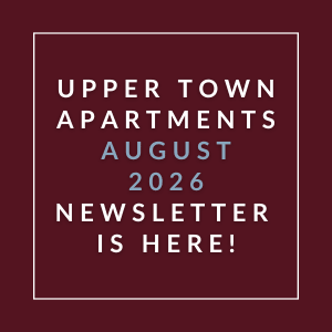 The image is a cover of the Upper Town Apartments August 2026 newsletter.