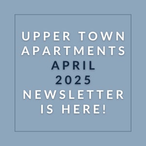 a blue background with the words upper town apartments 2020 newsletter is here