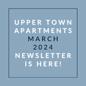 a blue background with the words upper town apartments march 2024 newsletter is here