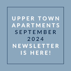a blue background with the words upper town apartments september 2024 newsletter is here