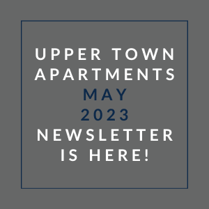 a gray background with a blue border and white text that reads upper town apartments may 23,