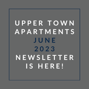 a gray background with a blue border and white text that reads upper town apartments june 23