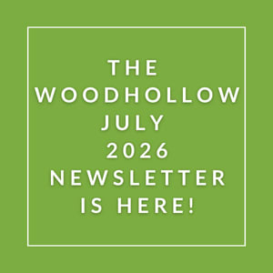 The image announces the availability of the Woodhollow July 2026 newsletter.