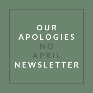A poster with the text "Our Apologies No April Newsletter" written on it.