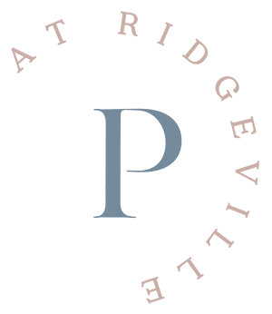 a pink triangle with an x and a pink infinity symbol