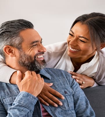 a man and a woman sitting on a couch