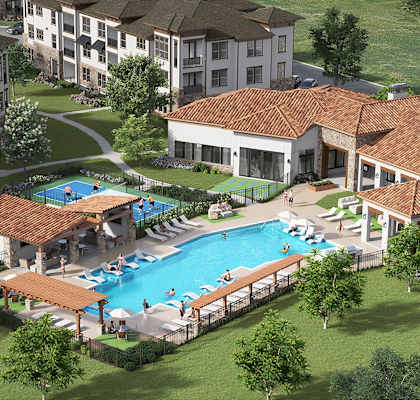 A resort with a swimming pool and a building with a red tile roof.