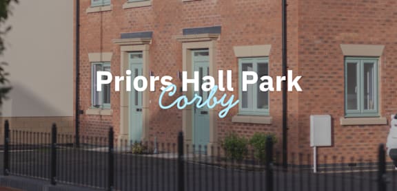 A brick building with the words Priors Hall Park Coby on it.