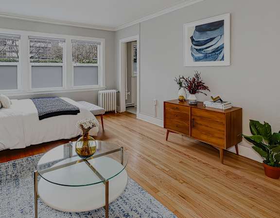 Studio apartment with hardwood flooring - John Winthrop Apartments