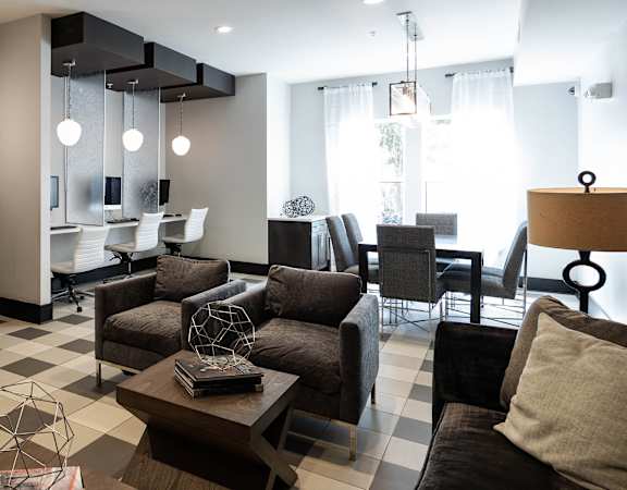 The Juncture Apartments business center with iMacs and PCs