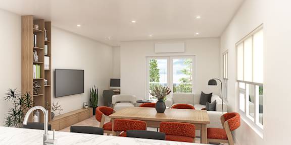 A modern living room with a wooden dining table and red chairs.