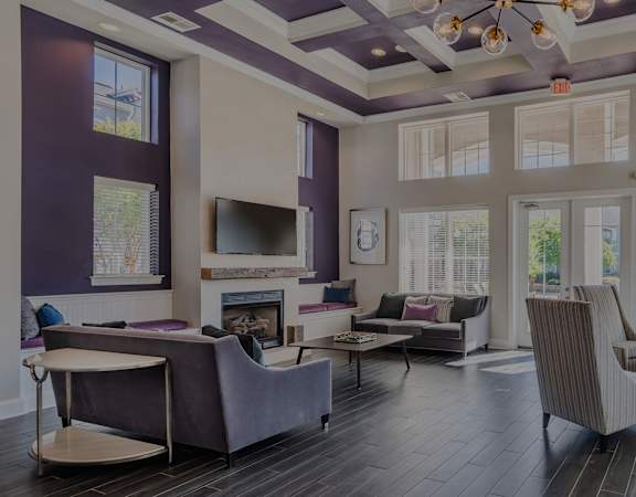 Resident clubhouse social area with fireplace - The Crossings at Alexander Place