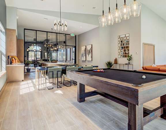 Resident clubhouse with game room - Emmersyn at Lone Star