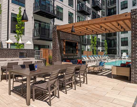 Pool-side cabana with nearby grilling station - Rockwell at Crown