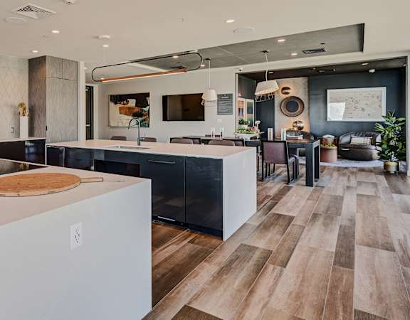Resident clubhouse with social, sitting and kitchen area - BLVD at Revere Beach