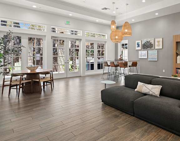 club room with couches and tables