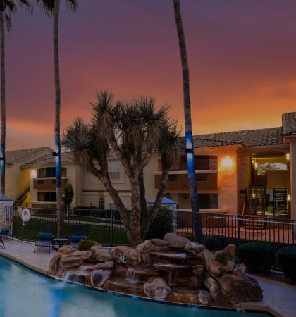 Arizona sunset at the resort-style swimming pool - Arrowhead Landing Apartments