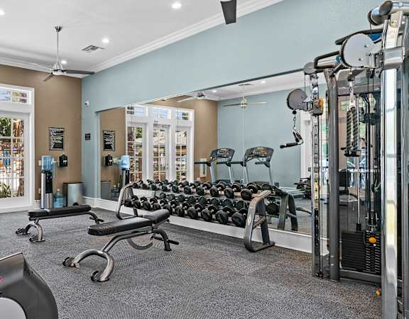 fitness center with weights and machines