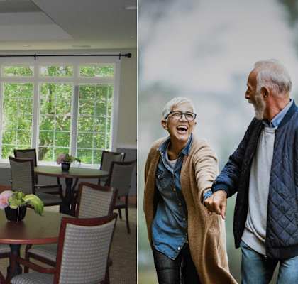 two people walking in a room with a table and chairs