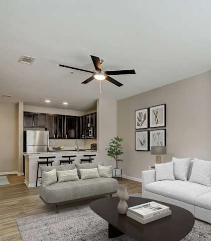 a living room with couches and a coffee table