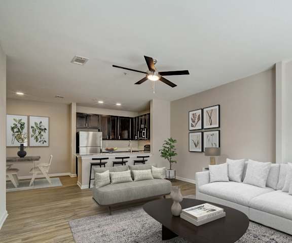 a living room with couches and a coffee table