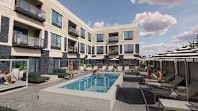 A modern apartment complex with a pool and lounge area.