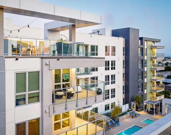 aerial view of Emerald apartment building with balconies and pool view