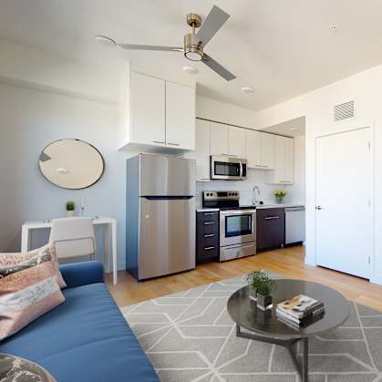 Kitchen Come Living Area at Proto Apartments, Denver, 80204
