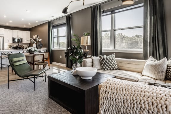 a living room with a couch and a table