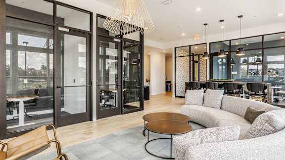 a living room with couches and a coffee table