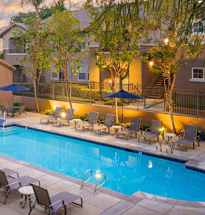 pool surrounded by lounges at Sonoma at Mapleton Apartments, California, 92563