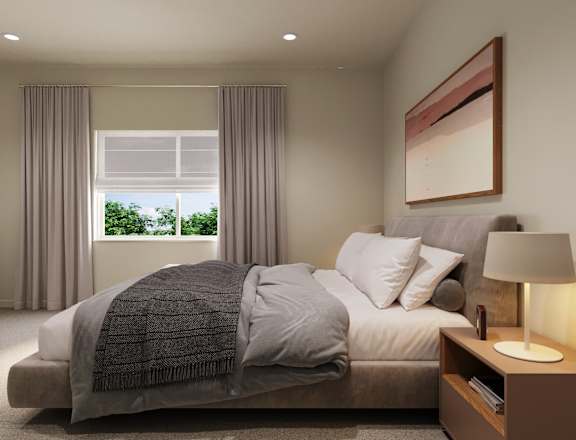 the master bedroom has a large bed and a large window