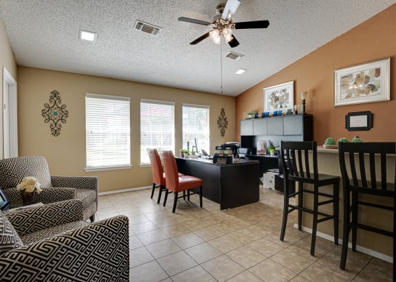 Leasing office exterior with desks and seating at Arbors Of Cleburne, Cleburne, 76033