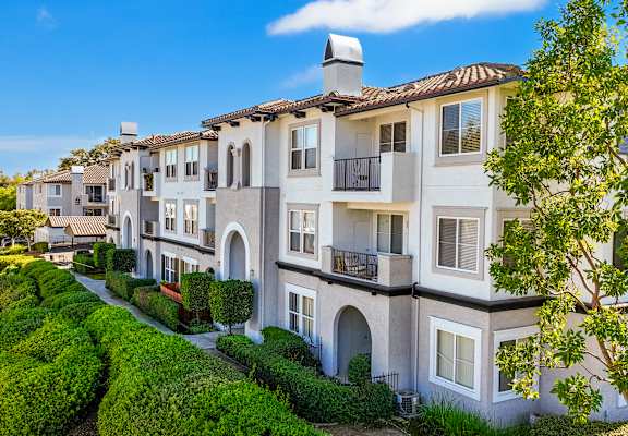 A row of houses with a clear blue sky above them at Missions at Chino Hills, Chino Hills